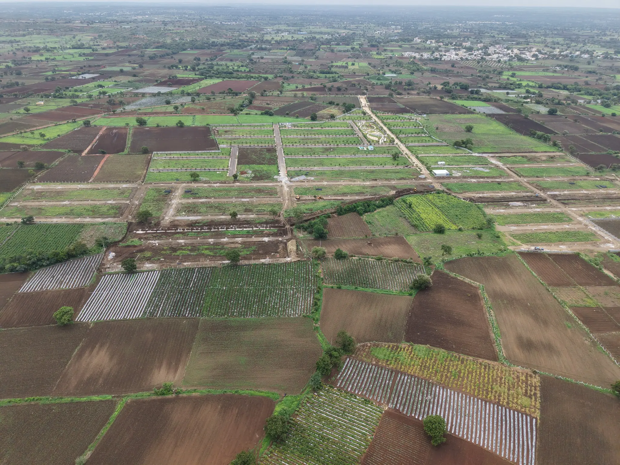 Aerial overview of the Sahasra residential plotted layout near Shankarpally