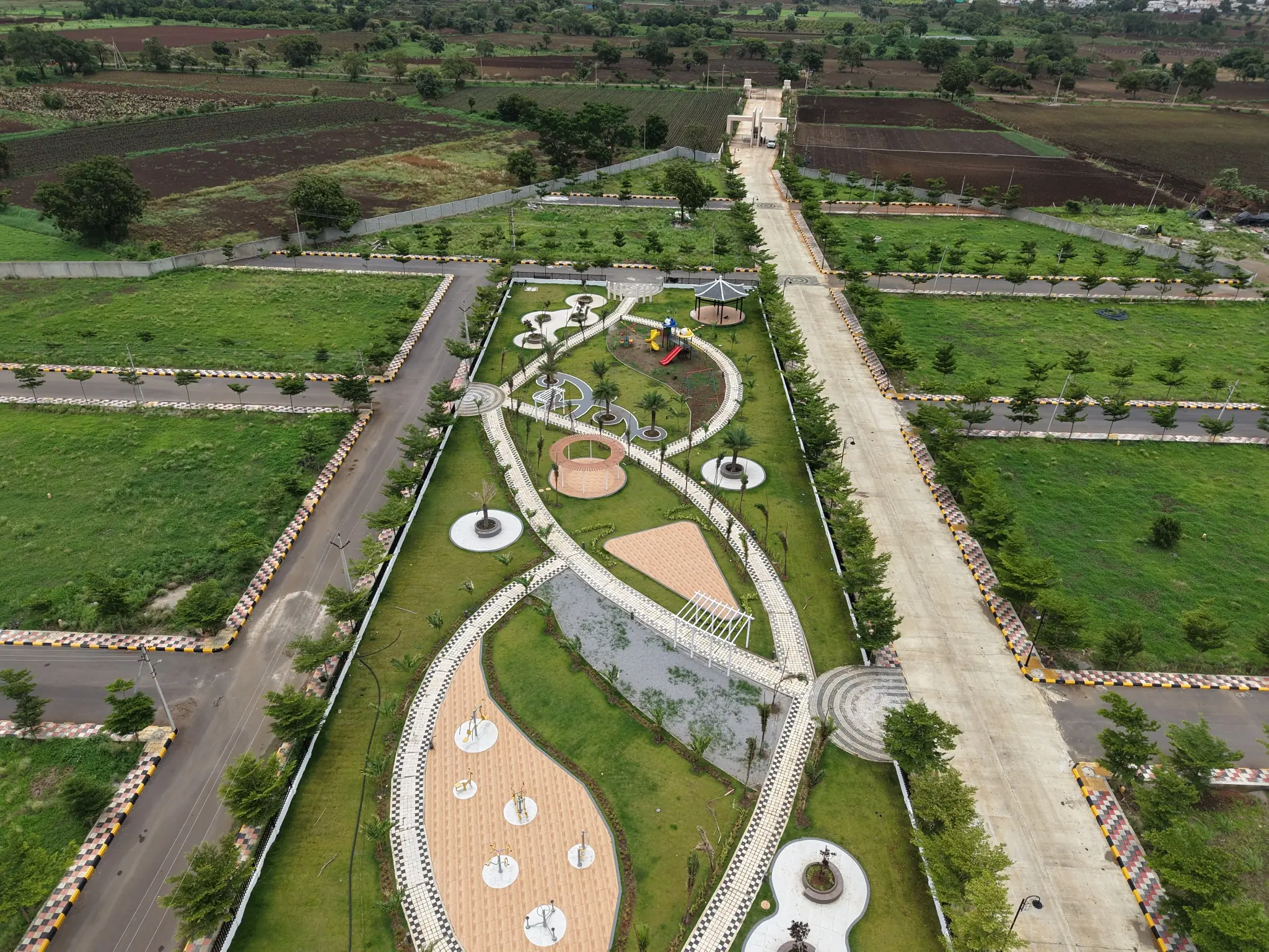 Landscaped central park and residential plots at the Sahasra project