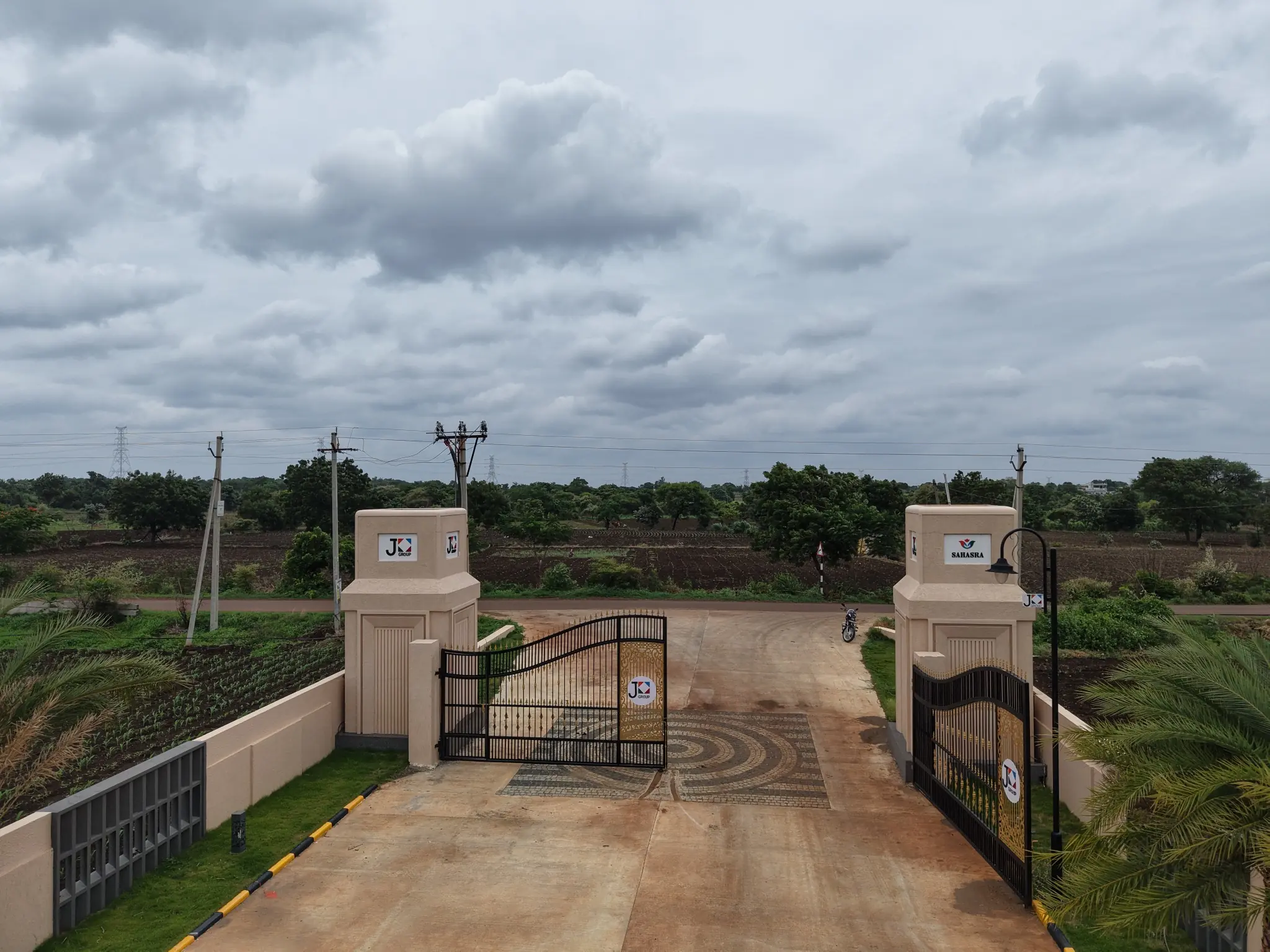 Secured main entrance at the Sahasra open plot project near Shankarpally