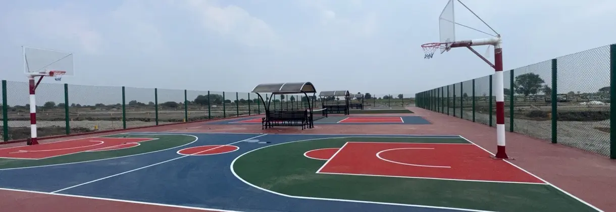 Basketball court at the Subhaga open plot project